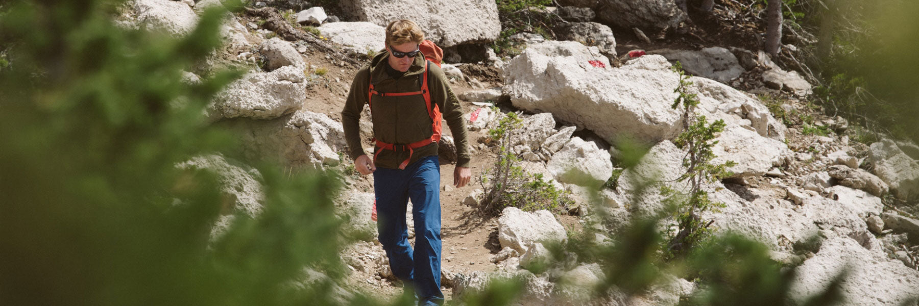 Person hiking wearing Kaenon sunglassees